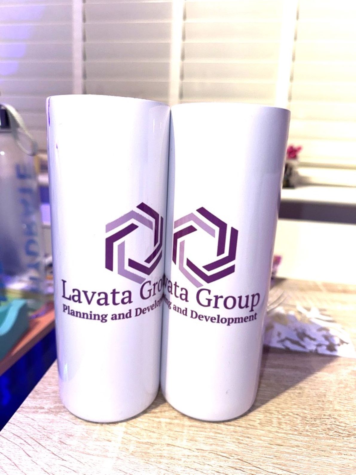 Stainless steel tumbler with company logo and text. Keeps drink warm or cold whilst advertising your brand